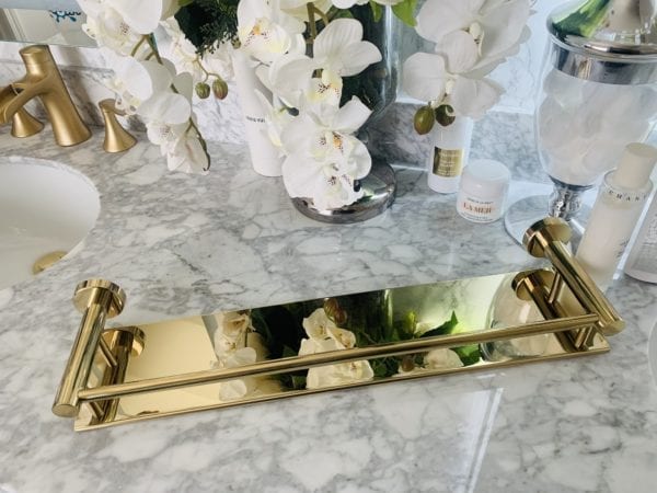 Gold wall shelf